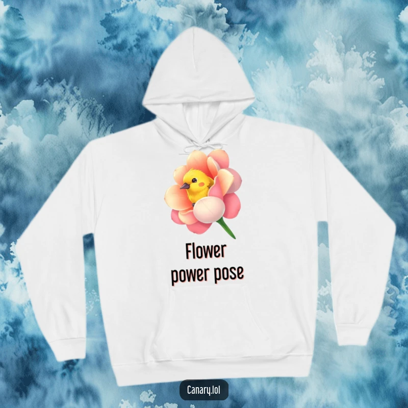 Funny hoodie depicting a curious canary bird peeking from a vibrantly colored flower, perfect for cozy and whimsical wear.