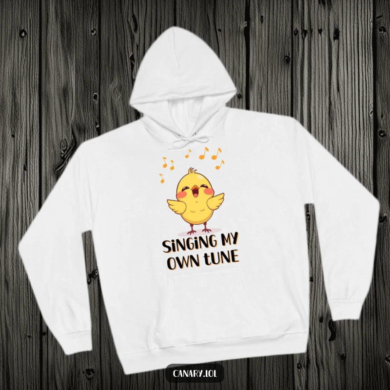 Funny kawaii canary hoodie featuring a cheerful bird singing joyfully, surrounded by floating musical notes, offering warm and humorous comfort.