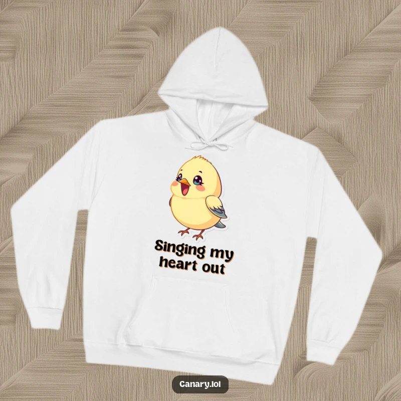 Funny Hoodie: A tiny, round canary bird with bright, expressive eyes sings passionately with its beak open, perfect for cozy listening.