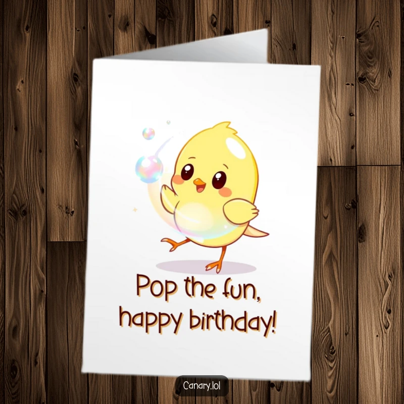 Funny Free Printable Birthday Card: A cheerful canary playfully leaps to catch a shimmering iridescent bubble, wishing happy birthday.