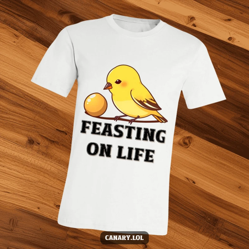 Funny T-Shirt: A small canary bird vigorously pecks at a gleaming seed, symbolizing focus on goals and tasty rewards.