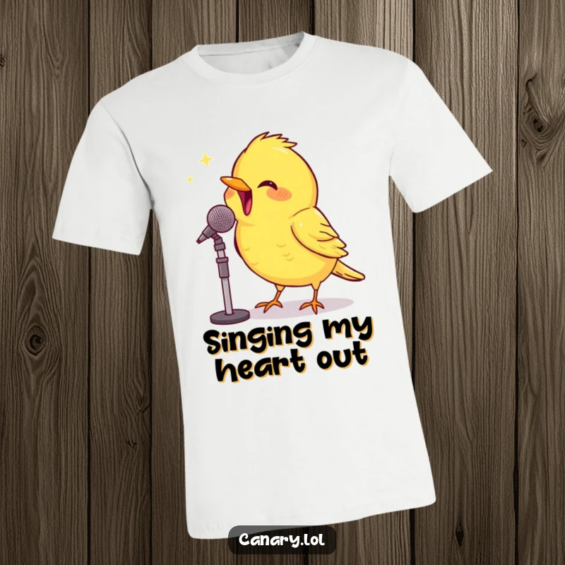 Funny T-Shirt: A small canary beams with pride while singing enthusiastically into a miniature microphone, capturing humorous stage presence.