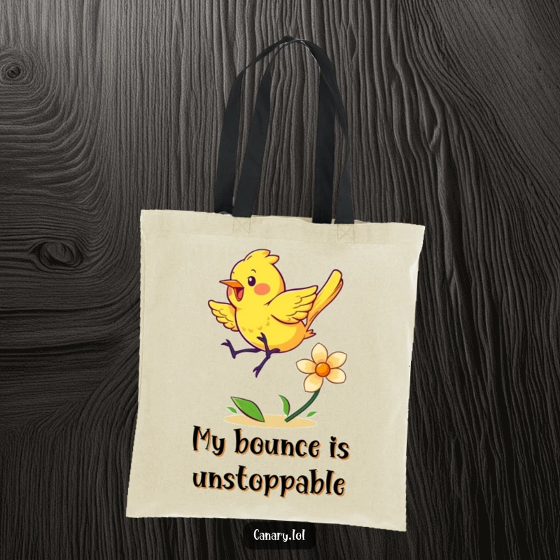Funny tote bag illustrating an energetic yellow canary in a playful bounce on a spring flower, practical and amusing.